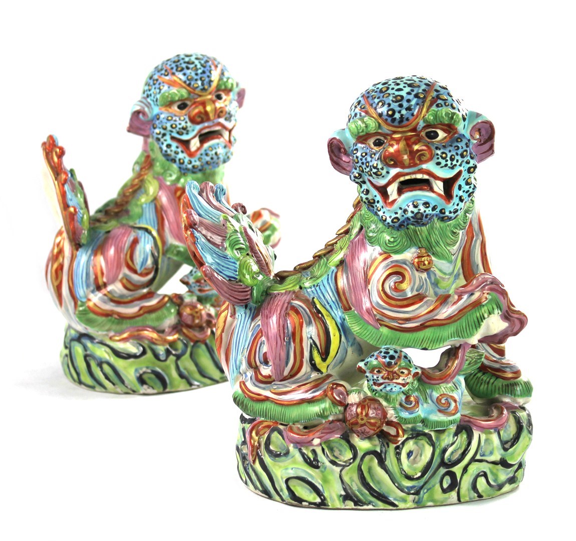 Appraisal: Two Chinese porcelain figures of buddhist lions th century each