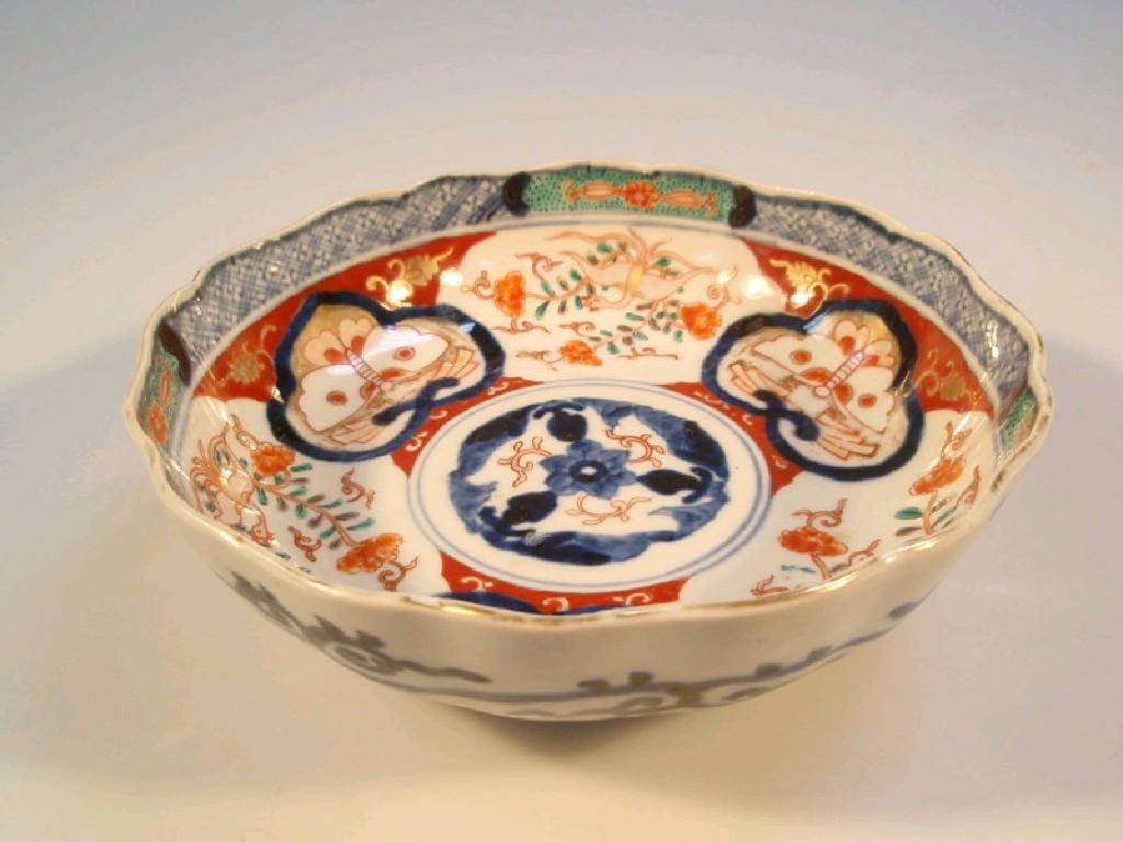 Appraisal: A Japanese Imari circular shallow bowl with a wavy rim