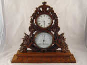 Appraisal: A late Victorian combined timepiece barometer and thermometer in mahogany