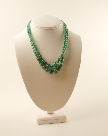 Appraisal: A Double Strand Emerald and Diamond Necklace princess length having