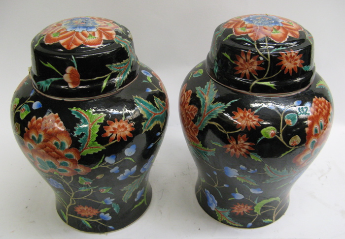 Appraisal: PAIR CHINESE ENAMELED GINGER JARS orange and blue flowers with