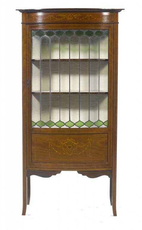 Appraisal: AN ENGLISH ART NOUVEAU MAHOGANY BOW FRONTED CHINA CABINET with