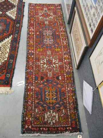 Appraisal: Heriz Persian Handmade Runner geometric designs floral border red field