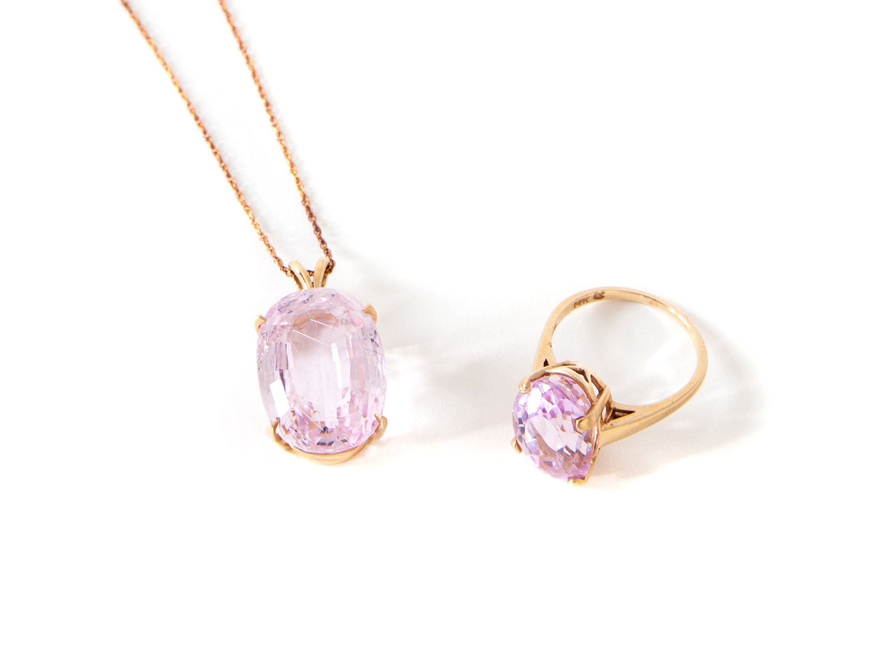 Appraisal: GOLD RING AND PENDANT WITH KUNZITE American st century Stamped