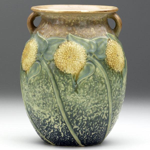 Appraisal: ROSEVILLE Sunflower vase Small clay imperfection to one bloom Unmarked