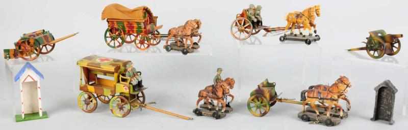 Appraisal: Elastolin Horse-Drawn Military Wagons Four sets include an ambulance covered