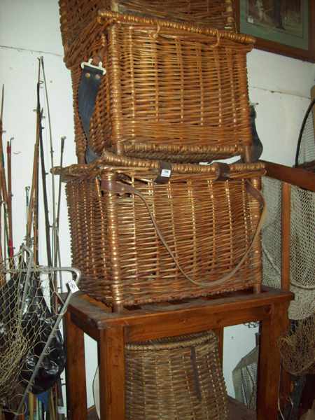 Appraisal: A COLLECTION OF FOUR CANE BASKETS AND A PINE STOOL