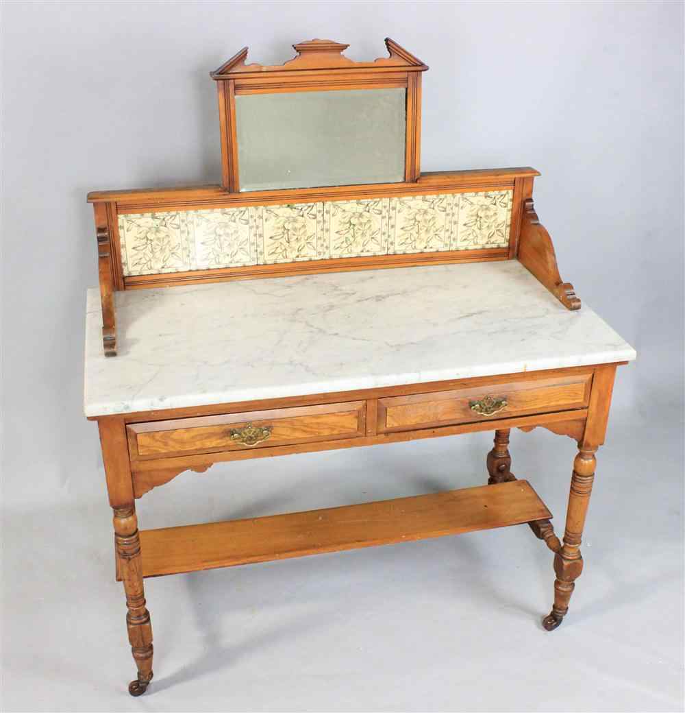 Appraisal: AMERICAN FRUITWOOD MARBLE TOP DRESSING TABLE circa the arched pediment