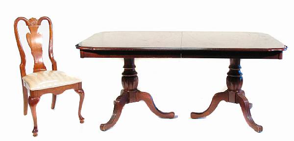 Appraisal: A George III style dining table together with six Queen