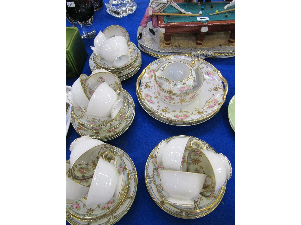 Appraisal: Noritake twelve setting teaset with gilt and rose decoration