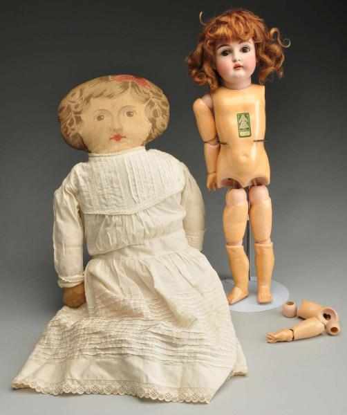 Appraisal: Lot of Antique Dolls Description Printed cloth girl some overall