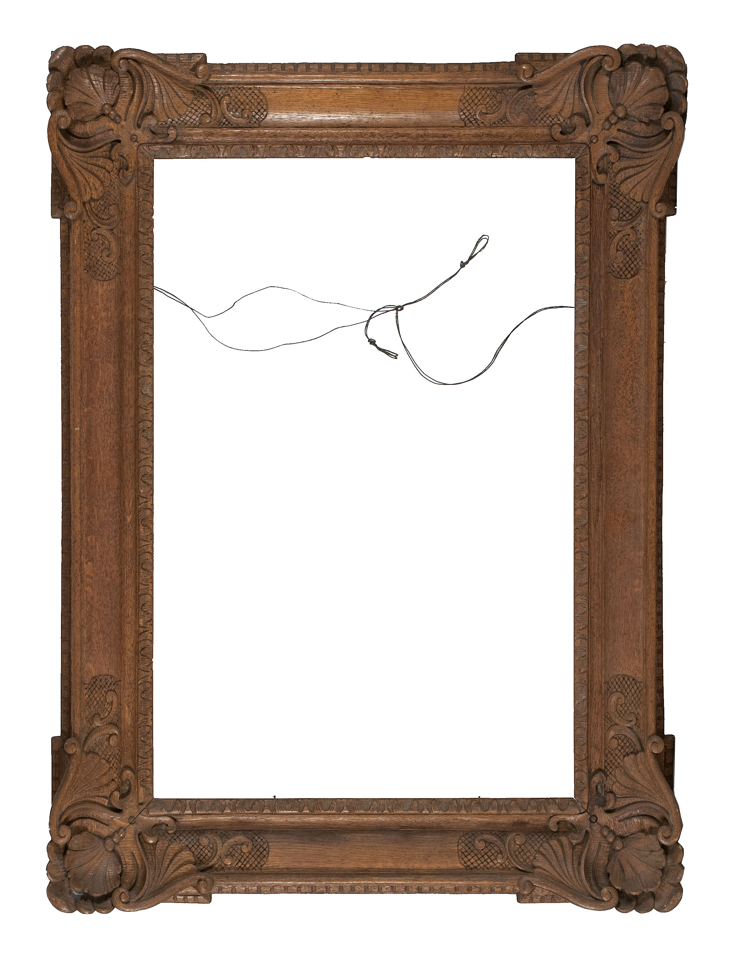 Appraisal: CARVED OAK PICTURE FRAME Decorated with shells in each corner