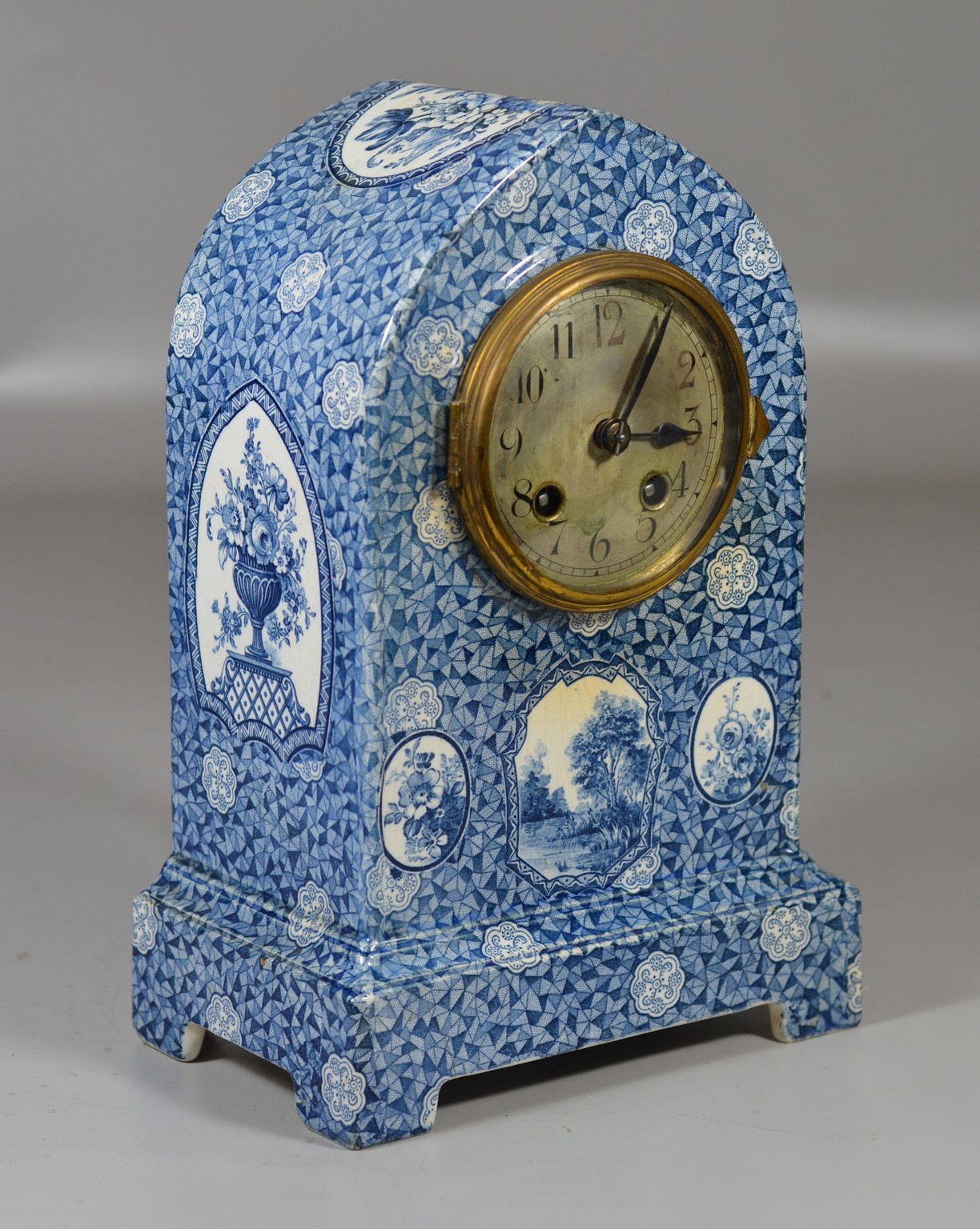 Appraisal: Blue and white transfer French porcelain shelf clock in the