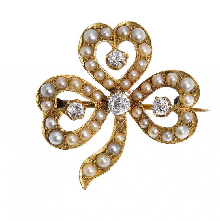 Appraisal: A BELLE EPOQUE DIAMOND AND SPLIT PEARL CLOVER LEAF BROOCH