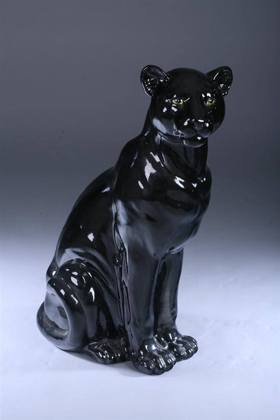 Appraisal: LARGE BLACK GLAZED CERAMIC PANTHER th century Seated with green