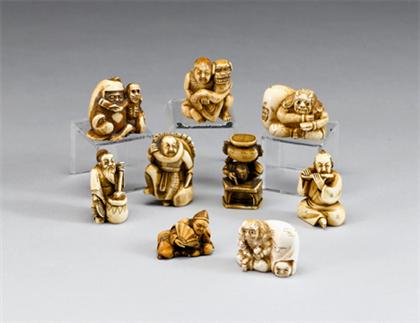 Appraisal: Nine Japanese elephant ivory netsuke th century Comprised of figural