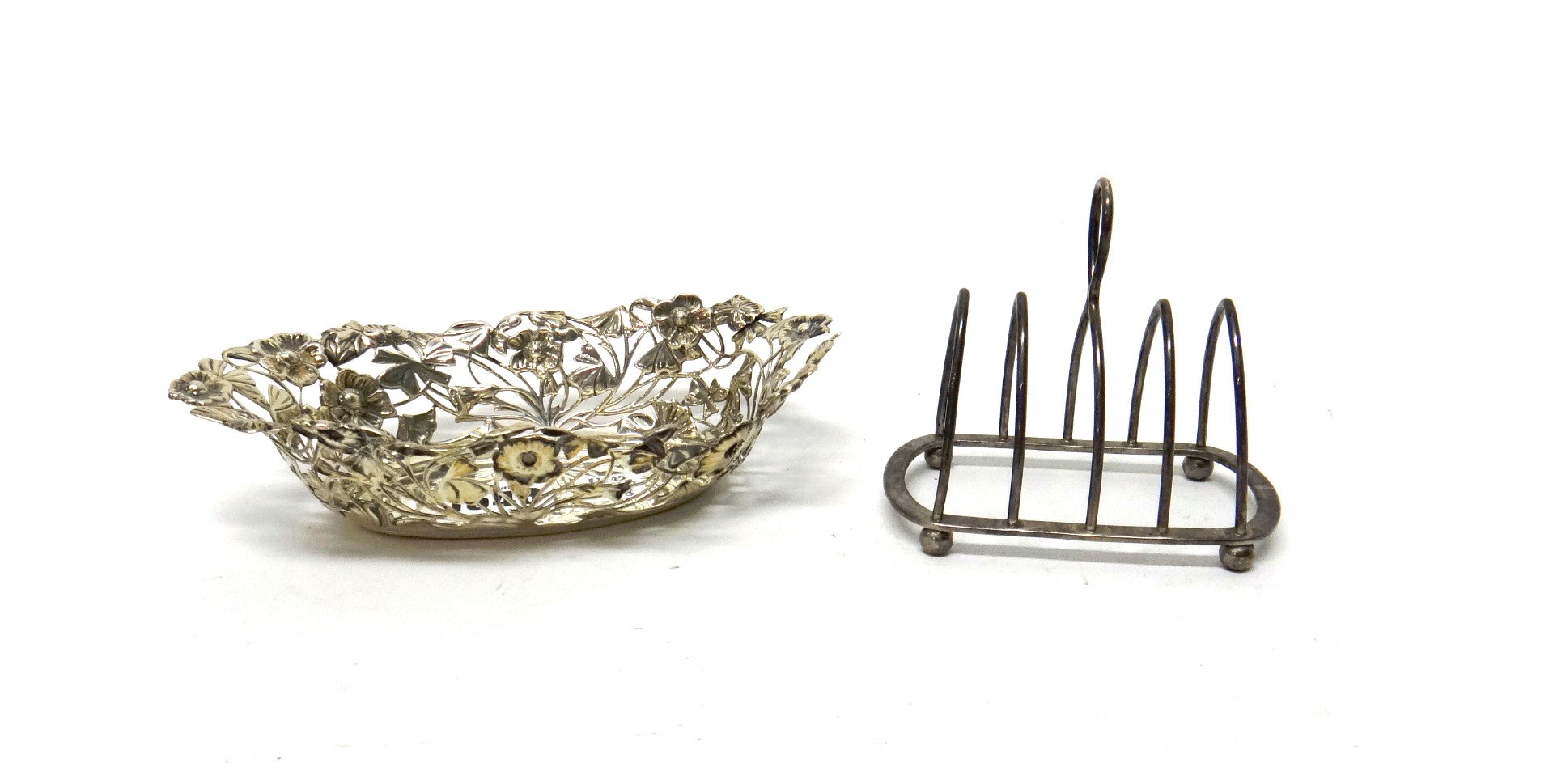 Appraisal: A silver bonbon basket of oval form pierced with floral