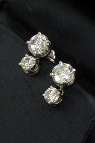 Appraisal: PAIR OF DIAMOND AND K WHITE GOLD EARRINGS each with