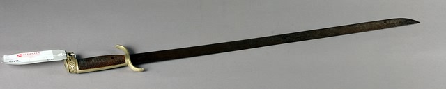 Appraisal: Spanish Officers Machete with eagle head pommel light markings on