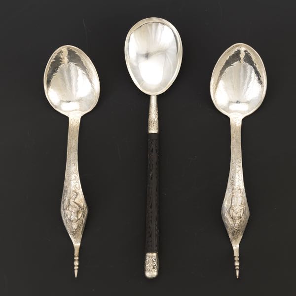 Appraisal: THREE SILVER SPOONS Two Thai silver spoons hand hammered marked