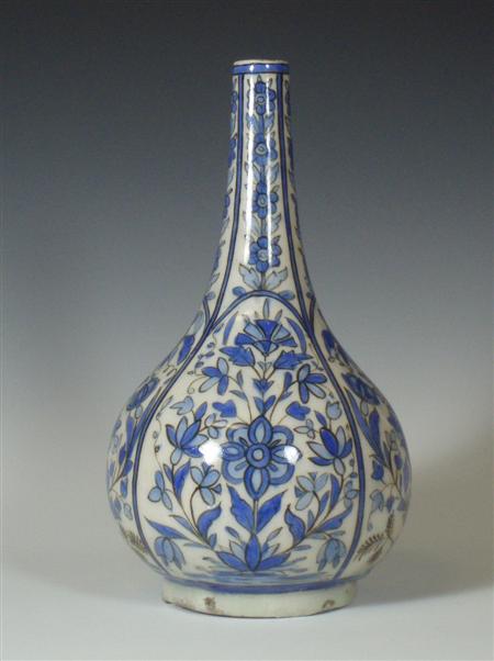 Appraisal: A th century Persian pottery blue painted bottle vase decorated