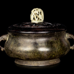 Appraisal: A Chinese Bronze Censer with a wood cover and a