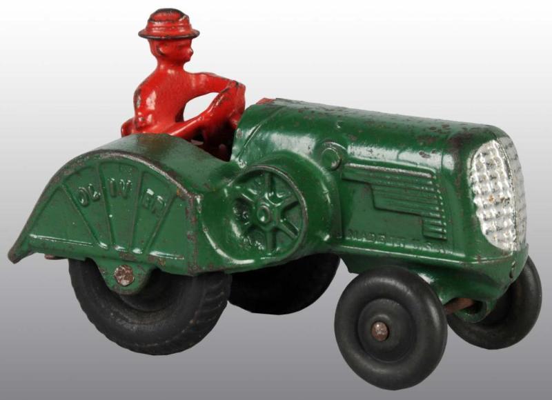 Appraisal: Cast Iron Arcade Oliver Tractor Toy Description Black rubber tires