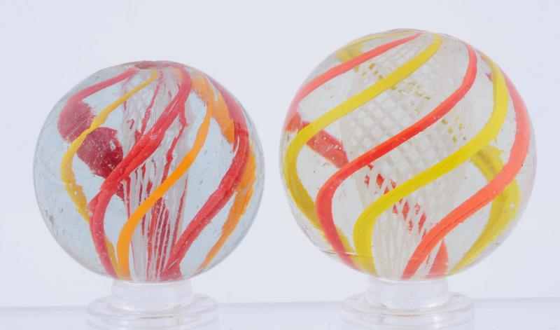 Appraisal: Lot Of English-Style Swirl Marbles The smallest is a red