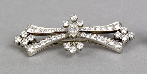 Appraisal: Platinum and diamond brooch with central marquise cut diamond and