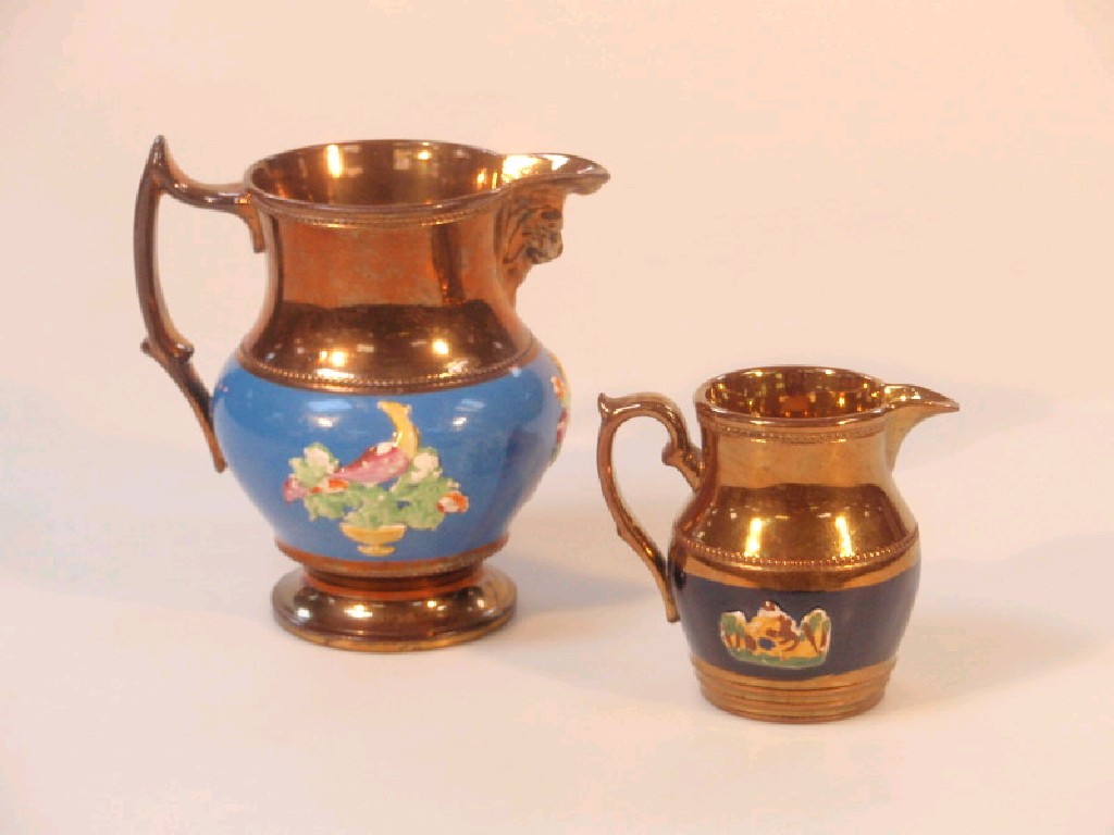 Appraisal: A mid thC copper lustre jug with a scroll handle