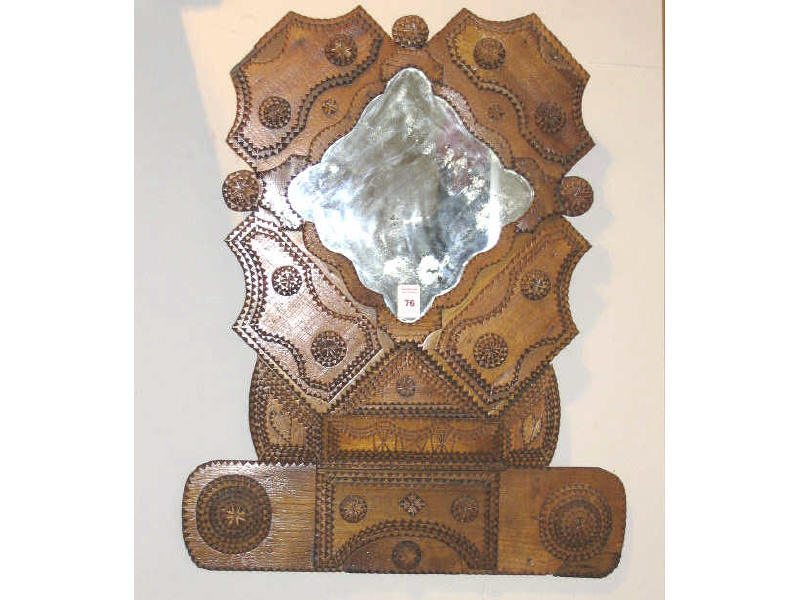 Appraisal: AMERICAN TRAMP ART WALL MIRROR Shaped frame in typical layered