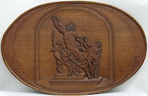 Appraisal: The Laoc on Group Carved Oval Plaque The plaque depicts