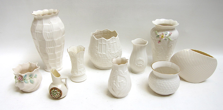 Appraisal: TEN BELLEEK PARIAN PORCELAIN VASES the small ewer shaped vessel