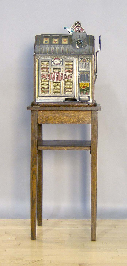 Appraisal: Pace Bantam Mint slot machine with an oak stand