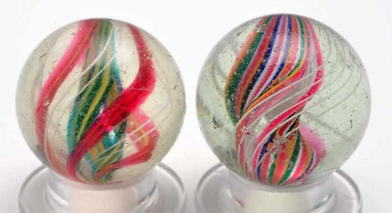 Appraisal: Lot of Swirl Marbles Description The smaller marble is a