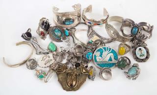 Appraisal: A variety of Sterling Silver Native American jewelry featuring a