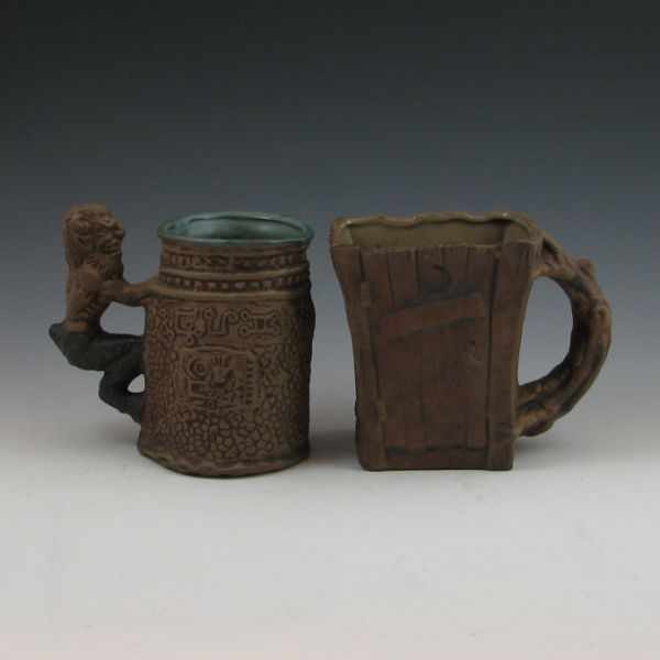 Appraisal: Rumph novelty mugs one an outhouse with a creature on