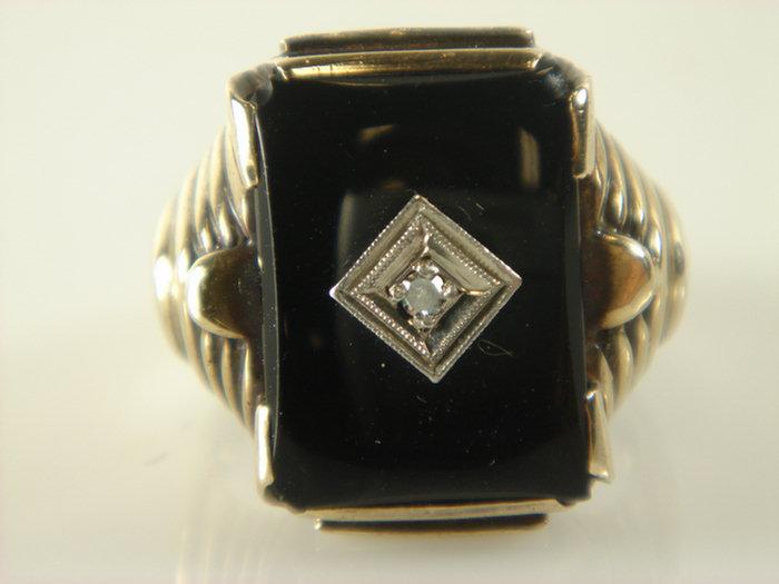 Appraisal: K onyx art deco man's ring with pt diamond size