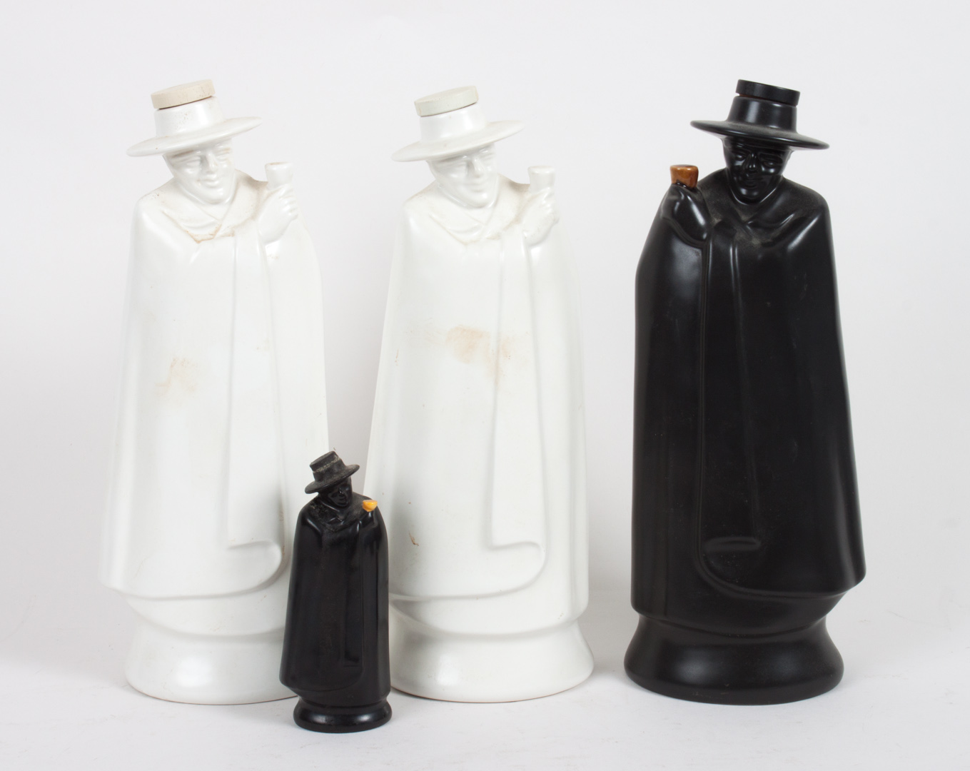 Appraisal: Four Wedgwood Sandeman figural decanters Pair of white and one