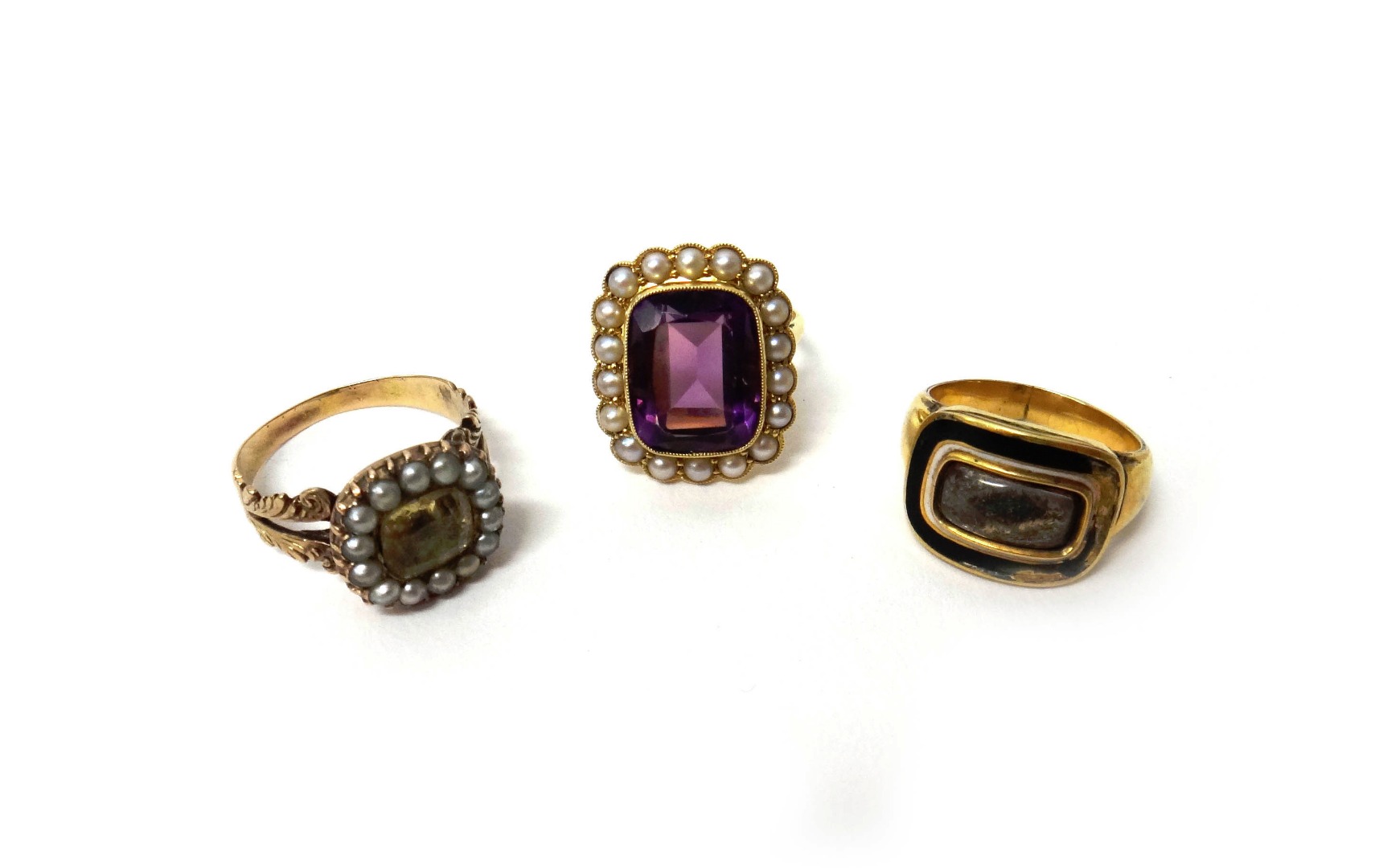 Appraisal: A gold amethyst and seed pearl set cluster ring mounted