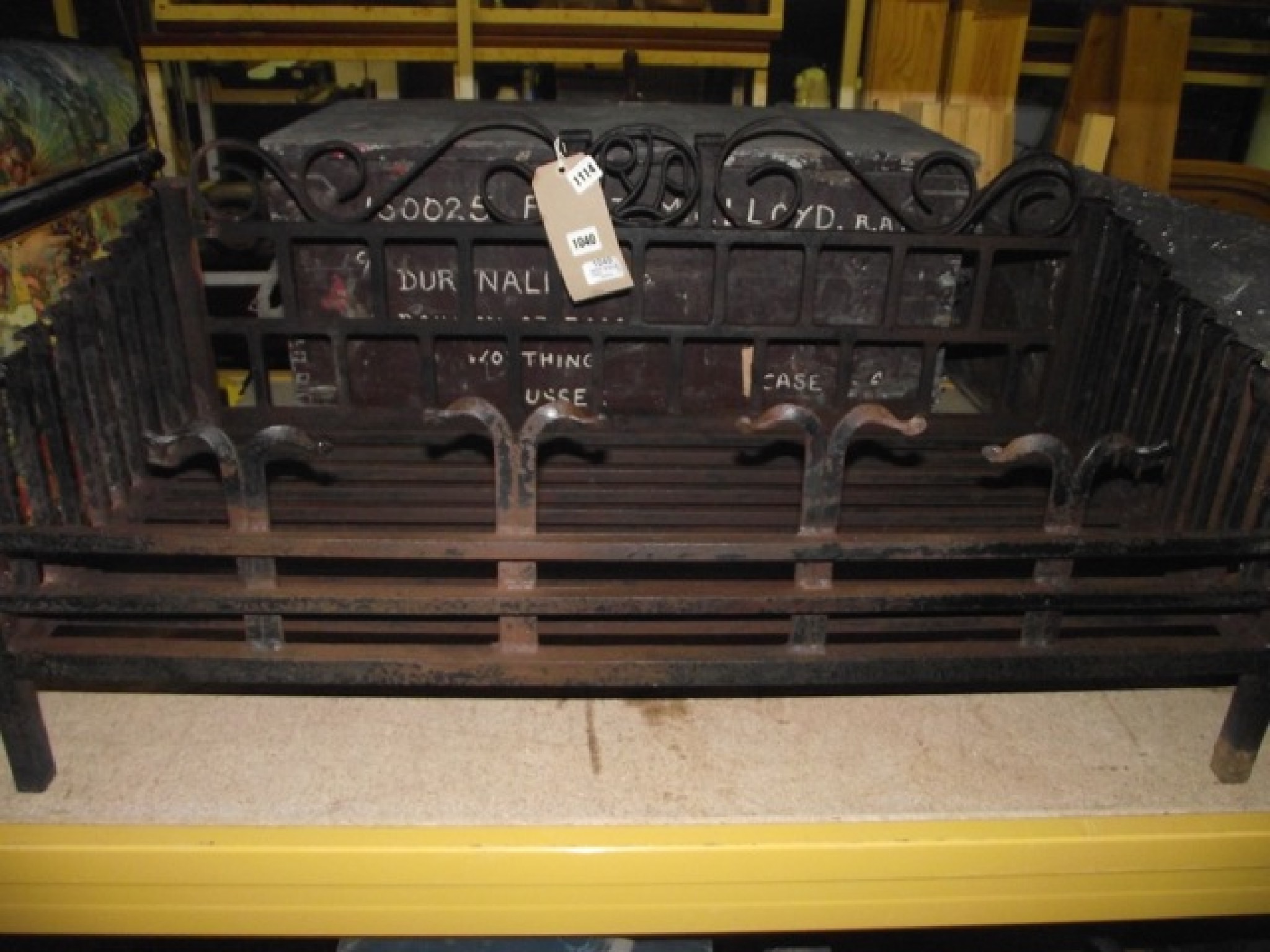 Appraisal: A cast iron fire basket of rectangular form with graduated