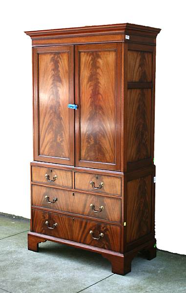 Appraisal: A George III style mahogany linen press th century height