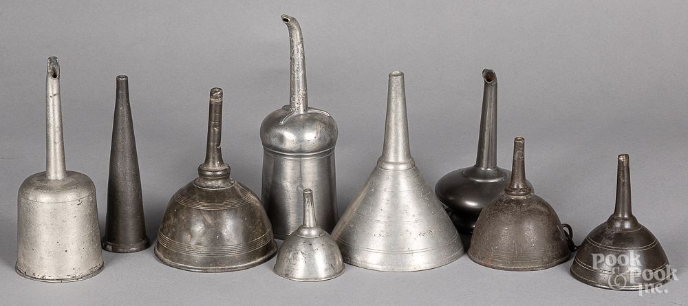 Appraisal: Nine pewter wine funnels Nine pewter wine funnels th th