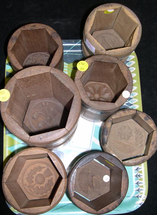 Appraisal: Seven hexagonal wooden butter presses all approximately '' wide designs