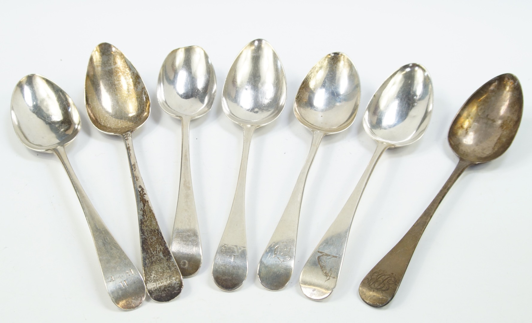 Appraisal: A group of George III silver table spoons decorated in