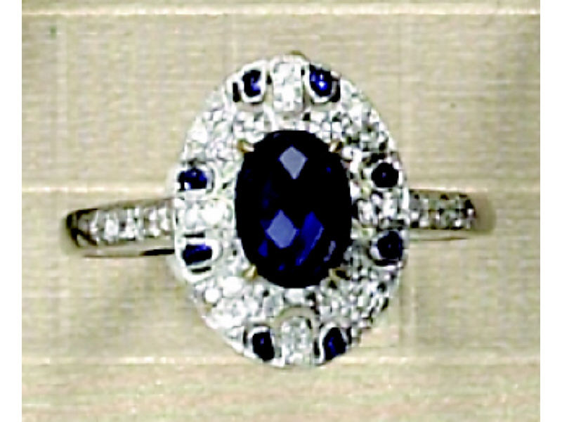 Appraisal: SAPPHIRE AND DIAMOND RING k white gold open design ring