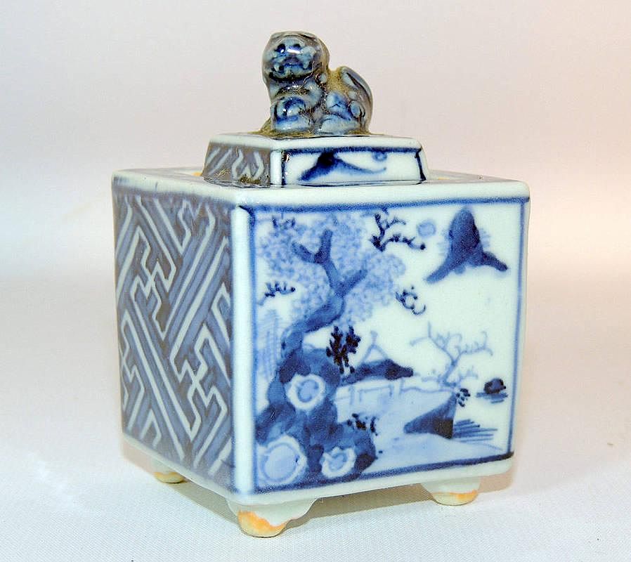 Appraisal: Chinese Porcelain Inkwell Blue and white decoration with foo dog