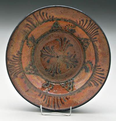 Appraisal: Moravian slip decorated plate fine redware plate in brown glaze