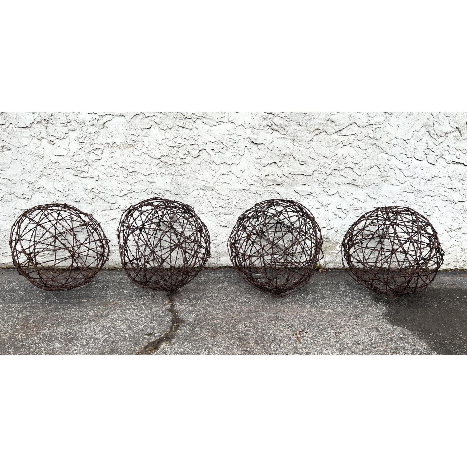 Appraisal: Set Barbed Wire Ball Garden sculptures Dimensions H inches W