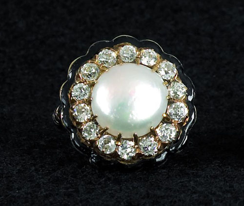 Appraisal: K yellow gold pearl and diamond ring with black enamel